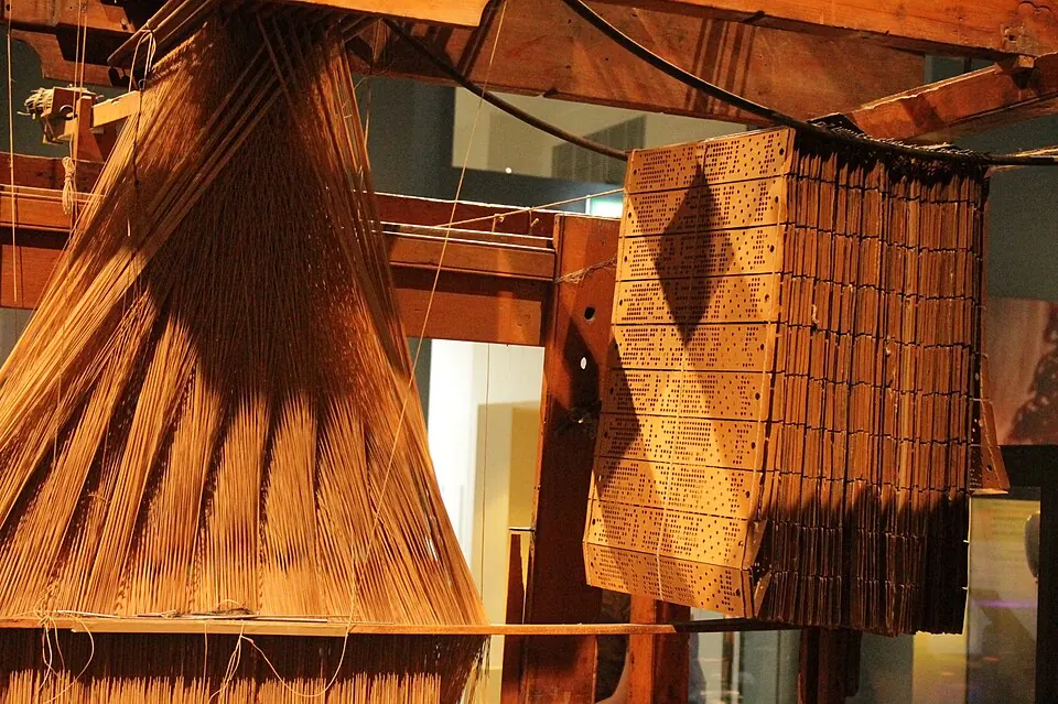 Jacquard loom with its punched cards. National Museum of Scotland.
